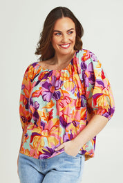 Model Jane wearing size 14 of the Sofia Cotton Top in colour Botanical, from the front, cropped image