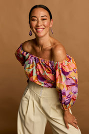 Model Katie wearing size 10 of the Sofia Cotton Top in colour Botanical, from the front, showing the whole outfit