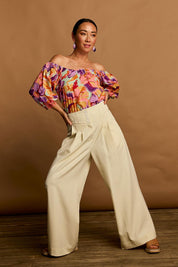 Model Katie wearing size 10 of the Sofia Cotton Top in colour Botanical, from the front, showing the whole outfit