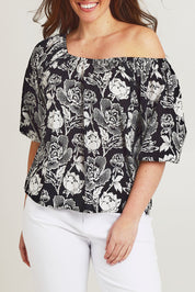 Model Jane wearing size 14 of the Sofia Cotton Top in colour Wildflower (Black), from the front, cropped image