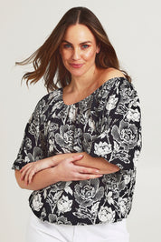 Model Jane wearing size 14 of the Sofia Cotton Top in colour Wildflower (Black), from the front, cropped image