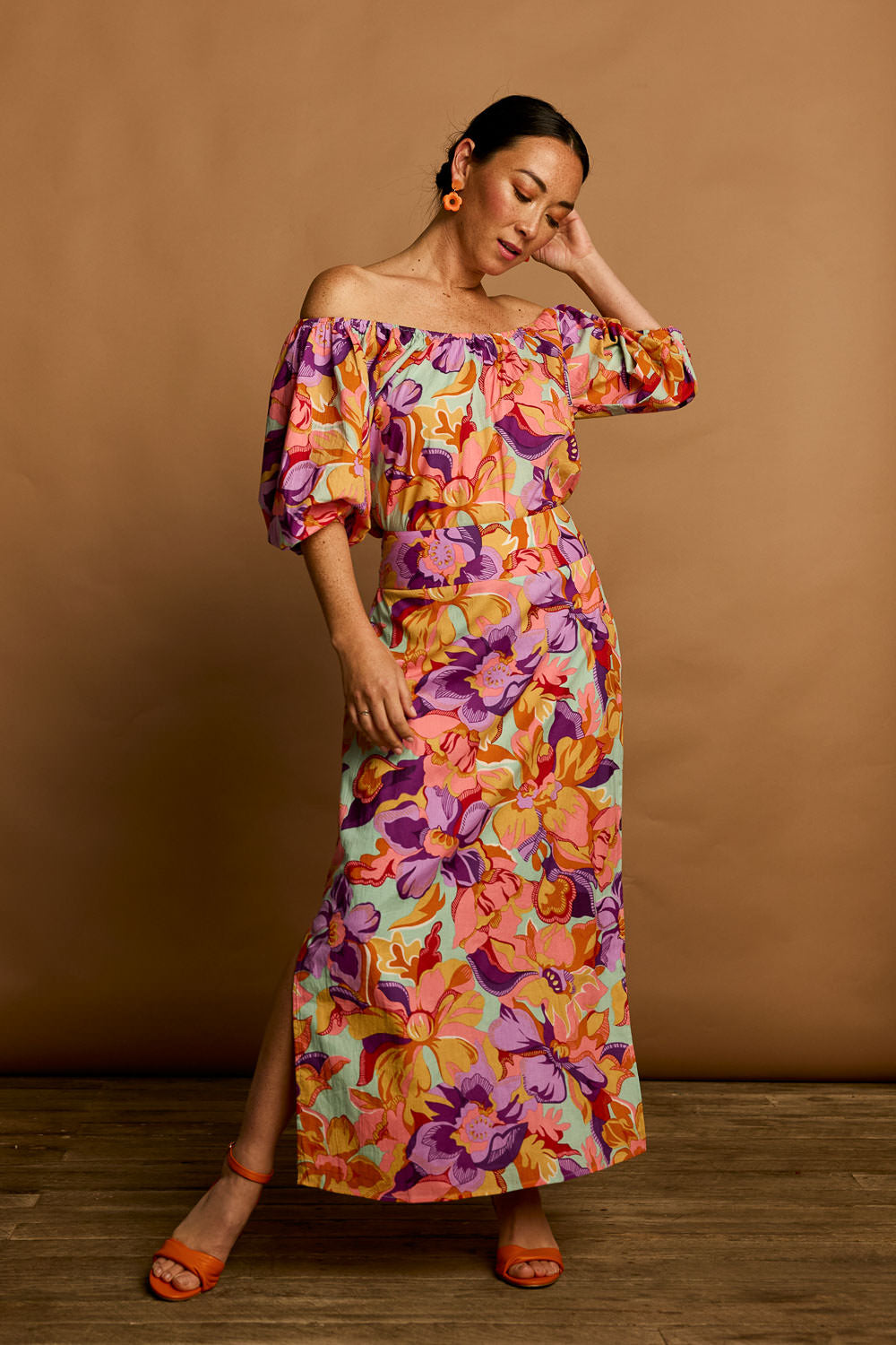 Model Katie wearing size 10 of the Clara Cotton Maxi Skirt in colour Botanical, from the front, showing the whole outfit