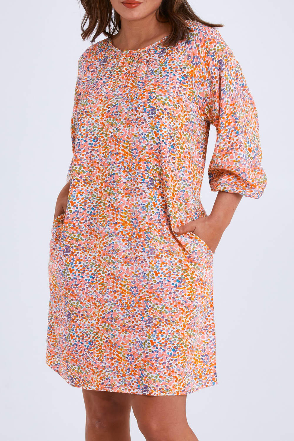 Model Monique wearing size 14 of the Odette Shift Dress in colour Vibrant (Pink), from the front, cropped image