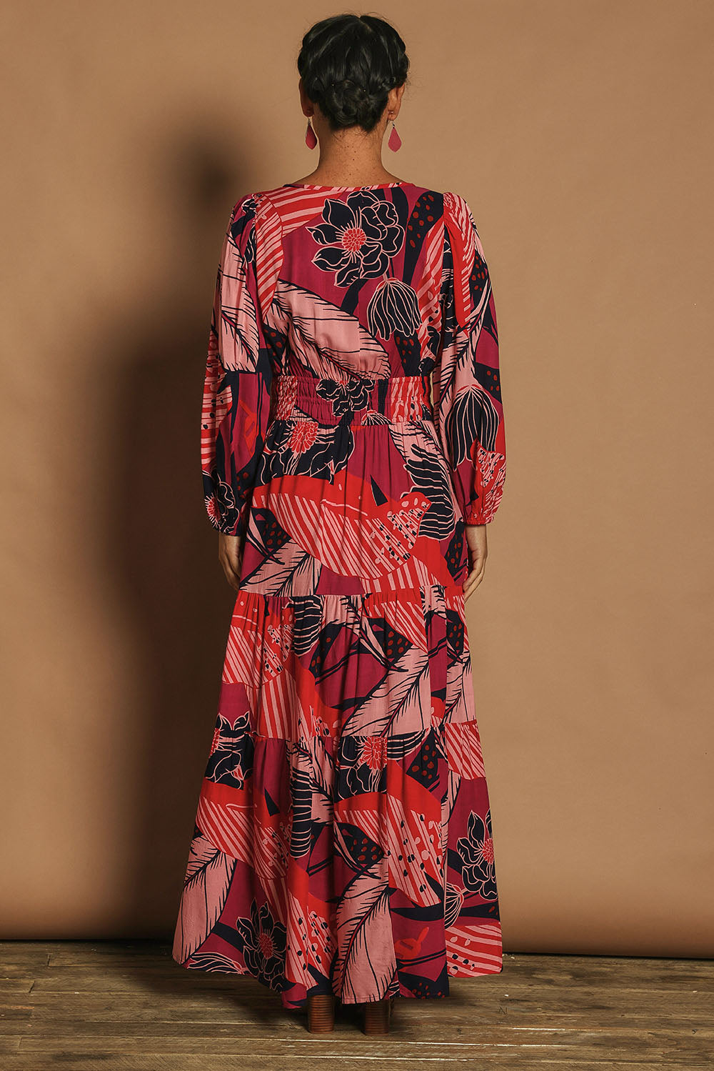 Model Katie wearing size 10 of the Gabbie Maxi Dress in colour Floral, from the back