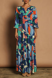Model Katie wearing size 10 of the Gabbie Maxi Dress in colour Marble (Blue), from the front, cropped image