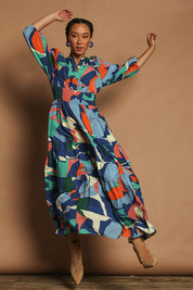 Model Katie wearing size 10 of the Gabbie Maxi Dress in colour Marble (Blue), from the front, showing the whole outfit