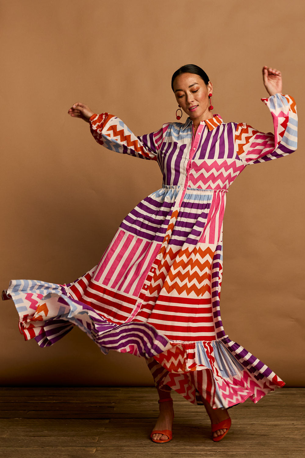 Model Katie wearing size 10 of the Nikki Cotton Maxi Dress in colour Patchwork, from the front, showing the whole outfit