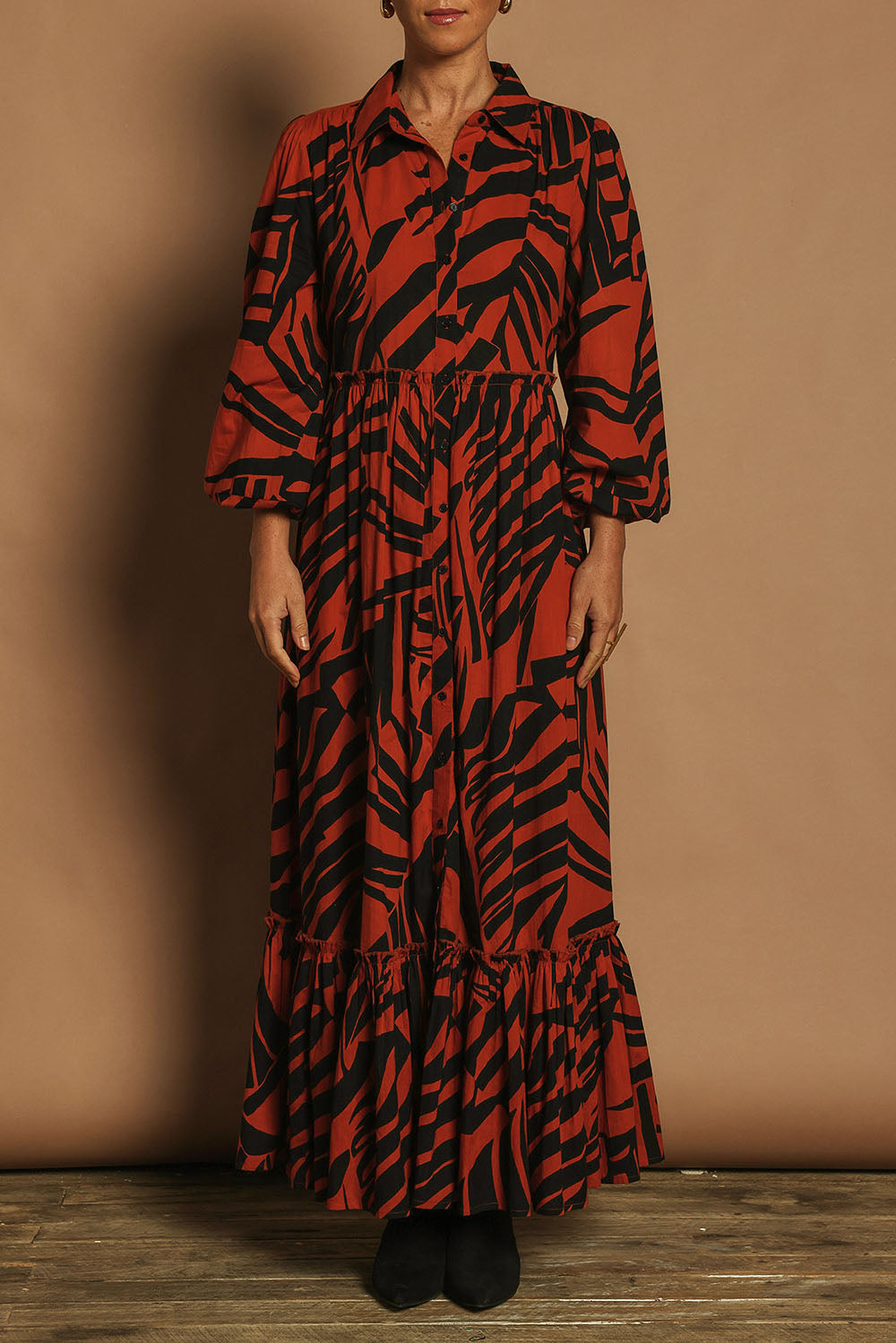 Model Katie wearing size 10 of the Nikki Cotton Maxi Dress in colour Tigerleaf, from the front, cropped image