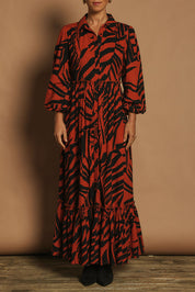 Model Katie wearing size 10 of the Nikki Cotton Maxi Dress in colour Tigerleaf, from the front, cropped image