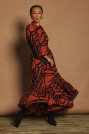 Model Katie wearing size 10 of the Nikki Cotton Maxi Dress in colour Tigerleaf, from the front, showing the whole outfit
