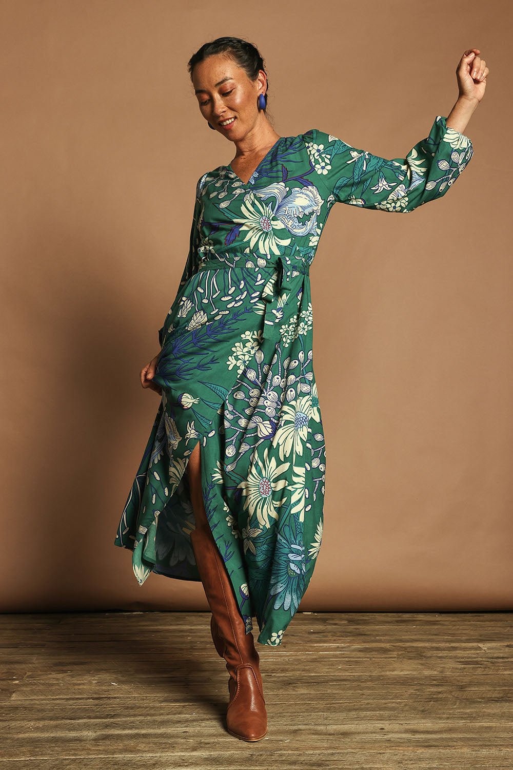 Model Katie wearing size 10 of the Daphne Maxi Wrap Dress in colour Darkgarden (Green), from the front, showing the whole outfit