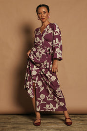 Model Katie wearing size 10 of the Daphne Maxi Wrap Dress in colour Tulip (Purple), from the front, showing the whole outfit