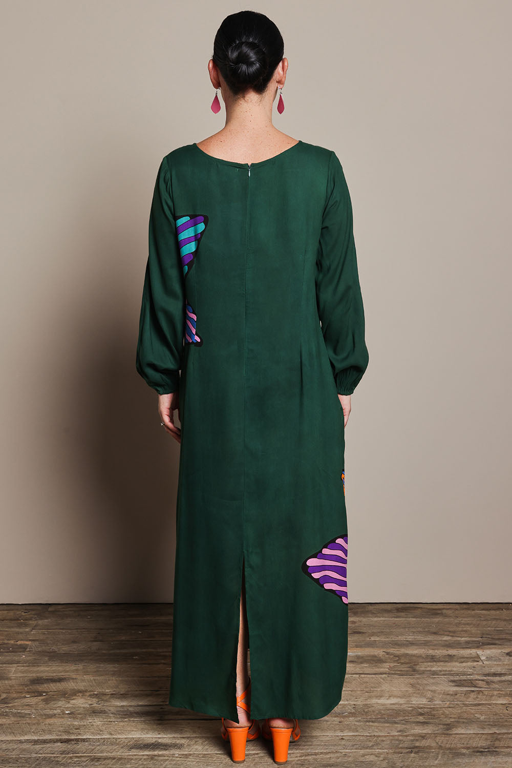 Model Katie wearing size 10 of the Zara Shift Dress in colour Flower (Green), from the back