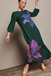 Model Katie wearing the Zara Shift Dress in colour Flower (Green), from the front, showing the whole outfit