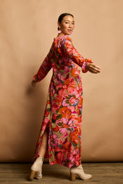 Model Katie wearing size 10 of the Zara Shift Dress in colour Botanical (Red), from the front, showing the whole outfit