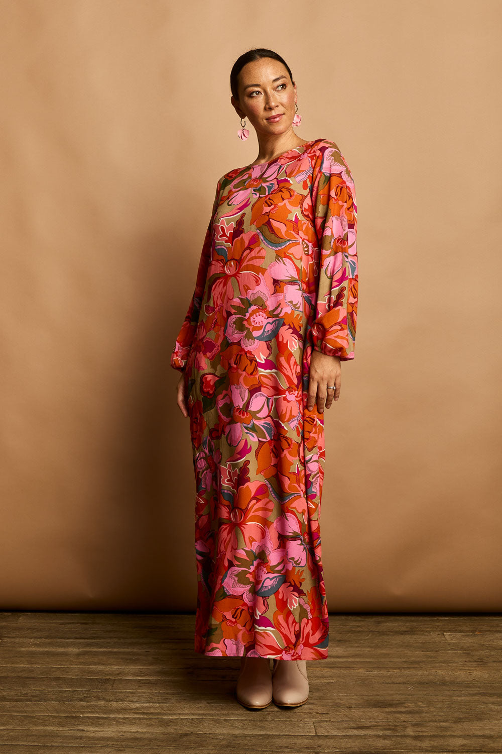 Model Katie wearing size 10 of the Zara Shift Dress in colour Botanical (Red), from the front, showing the whole outfit
