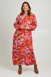 Model Monique wearing size 14 of the Zara Shift Dress in colour Botanical (Red), from the front, showing the whole outfit
