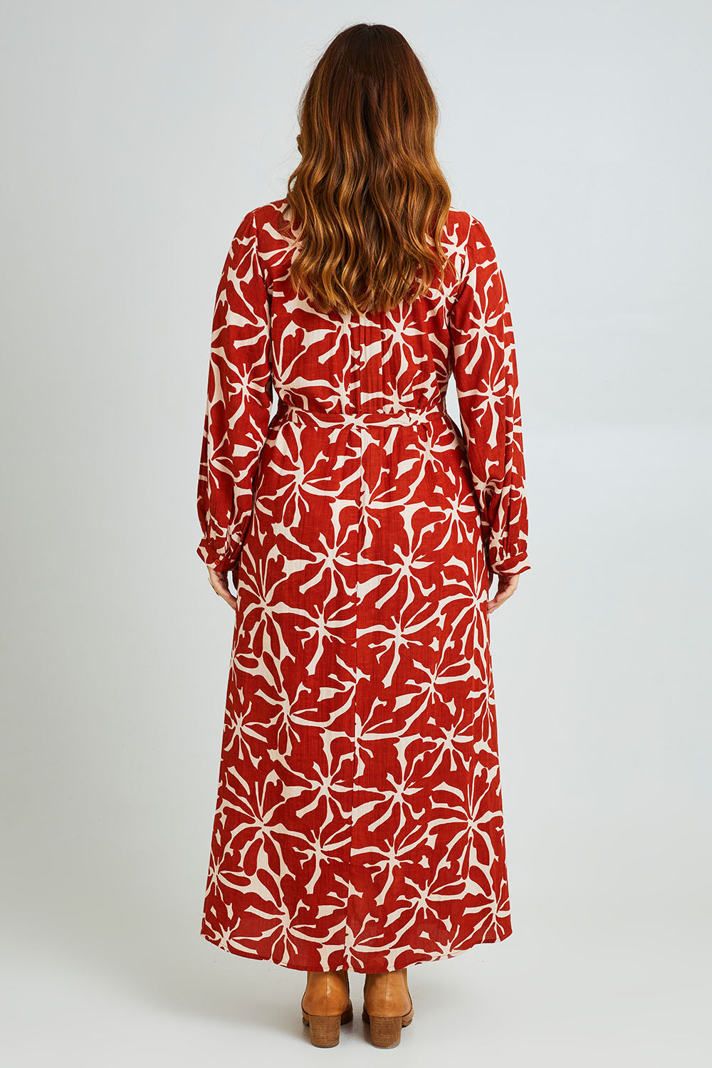 Model Laura wearing size 14 of the Naomi Shirt Dress in colour Zinna, from the back