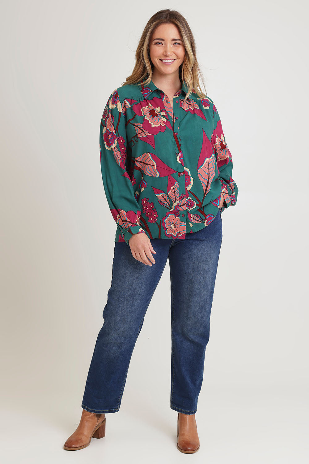 Model Chanel wearing size 16 of the Luna Shirt in colour Oleander, from the front, showing the whole outfit