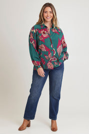 Model Chanel wearing size 16 of the Luna Shirt in colour Oleander, from the front, showing the whole outfit