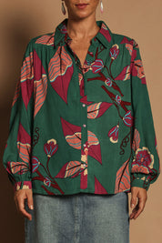 Model Katie wearing size 10 of the Luna Shirt in colour Oleander, from the front, cropped image