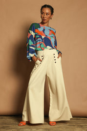 Model Katie wearing size 10 of the Harriet Blouse in colour Marble (Blue), from the front, showing the whole outfit