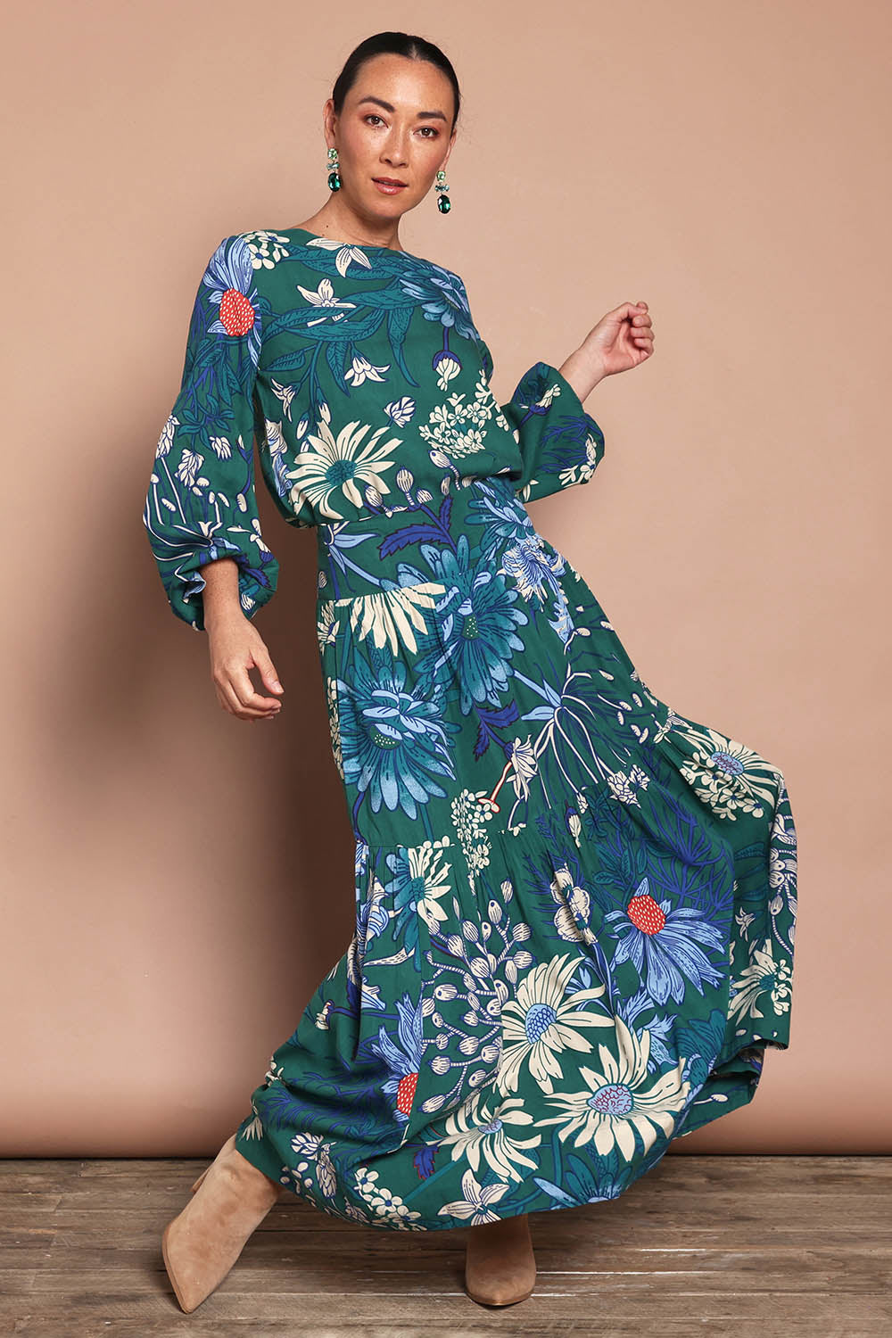 Model Katie wearing size 10 of the Harriet Blouse in colour Deepgreen (Green), from the front, showing the whole outfit