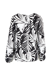 Product shot of the Harriet Blouse in colour Fern (Black), from the back