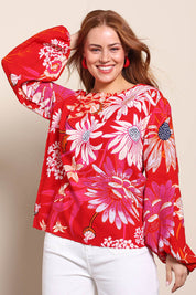 Model Georgiel wearing size 10 of the Harriet Blouse – Garden in colour Garden, in a cropped view