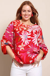 Model Georgiel wearing size 10 of the Harriet Blouse – Garden in colour Garden, in a cropped view