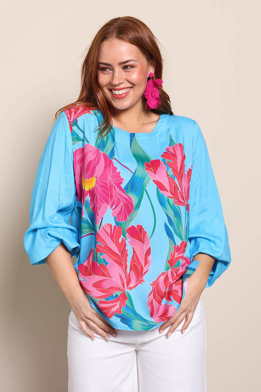 Model Georgiel wearing size 10 of the Harriet Blouse – Meadow in colour Meadow, in a cropped view