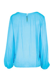 Product shot of the Harriet Blouse – Meadow in colour Meadow, from the back