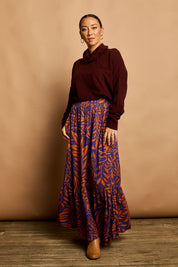 Model Katie wearing size 10 of the Harper Skirt in colour Gardenmaze (Blue), from the front, showing the whole outfit