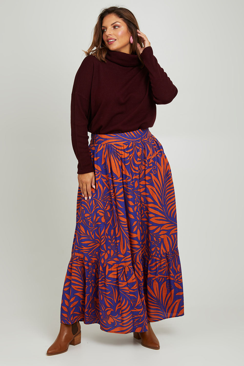 Model Monique wearing size 14 of the Harper Skirt in colour Gardenmaze (Blue), from the front, showing the whole outfit