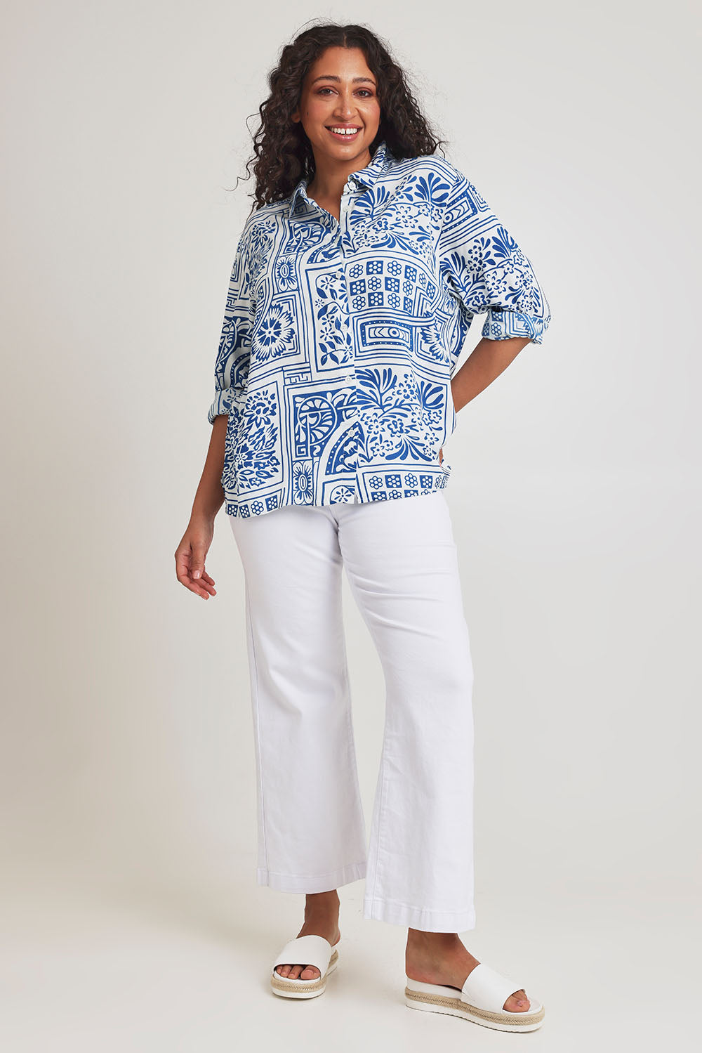 Model Terri-Leigh wearing size 14 of the Kelly Relaxed Shirt in colour Labyrinth (Blue), from the front, showing the whole outfit