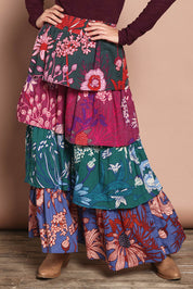 Model Katie wearing size 10 of the Juliet Cotton Tiered Skirt in colour Garden, from the front, cropped image