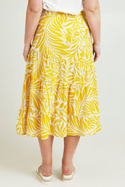 Model Jane wearing size 14 of the Isabell Cotton Wrap Skirt in colour Gardenmaze, from the back