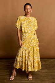 Model Katie wearing size 10 of the Isabell Cotton Wrap Skirt in colour Gardenmaze, from the front, showing the whole outfit