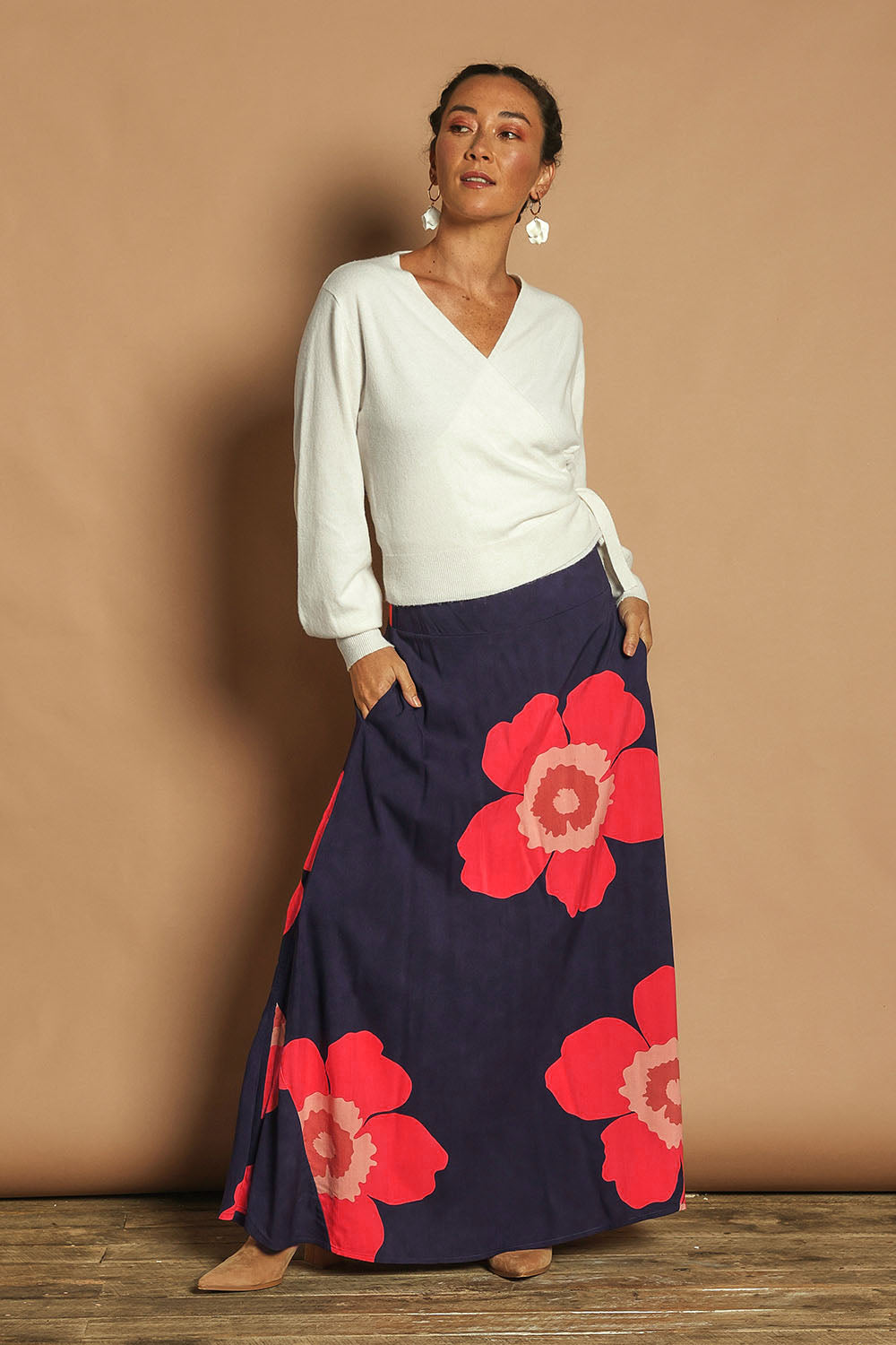 Model Katie wearing size 10 of the Rosie Maxi Skirt in colour Boldflower (Blue), from the front, showing the whole outfit