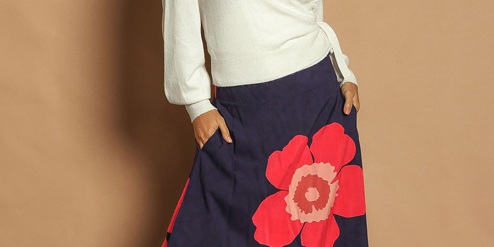 Model Katie wearing size 10 of the Rosie Maxi Skirt in colour Boldflower (Blue), from the front, showing the whole outfit