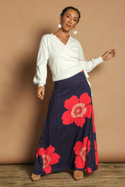 Model Katie wearing size 10 of the Rosie Maxi Skirt in colour Boldflower (Blue), from the front, showing the whole outfit