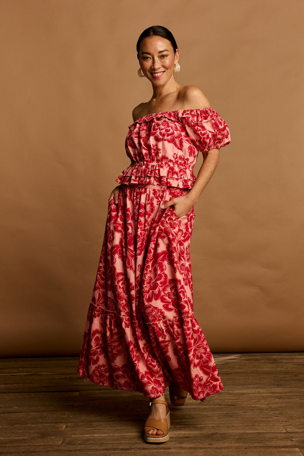 Model Katie wearing size 10 of the Annie Cotton Frill Blouse in colour Blooming (Pink), from the front, showing the whole outfit