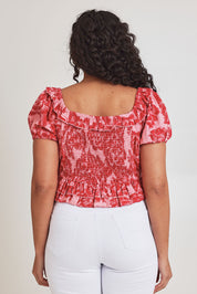 Model Terri-Leigh wearing size 14 of the Annie Cotton Frill Blouse in colour Blooming (Pink), from the back