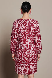 Model Katie wearing size 10 of the Kate Cotton Shift Dress in colour Gardenmaze (Pink), from the back