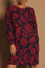 Model Katie wearing size 10 of the Kate Cotton Shift Dress in colour Gerbera (Blue), from the front, cropped image