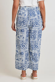Model Terri-Leigh wearing size 14 of the Katherine Pant in colour Labyrinth (Blue), from the back