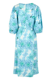 Product shot of the Vivienne Cotton Dress in colour Rosettes (Blue), from the back