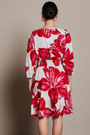 Model Katie wearing size 10 of the Gabrielle Dress in colour Lilly (Pink), from the back