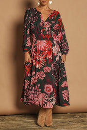 Model Katie wearing size 10 of the Gwyn Midi Dress in colour Greygarden (Pink), from the front, cropped image