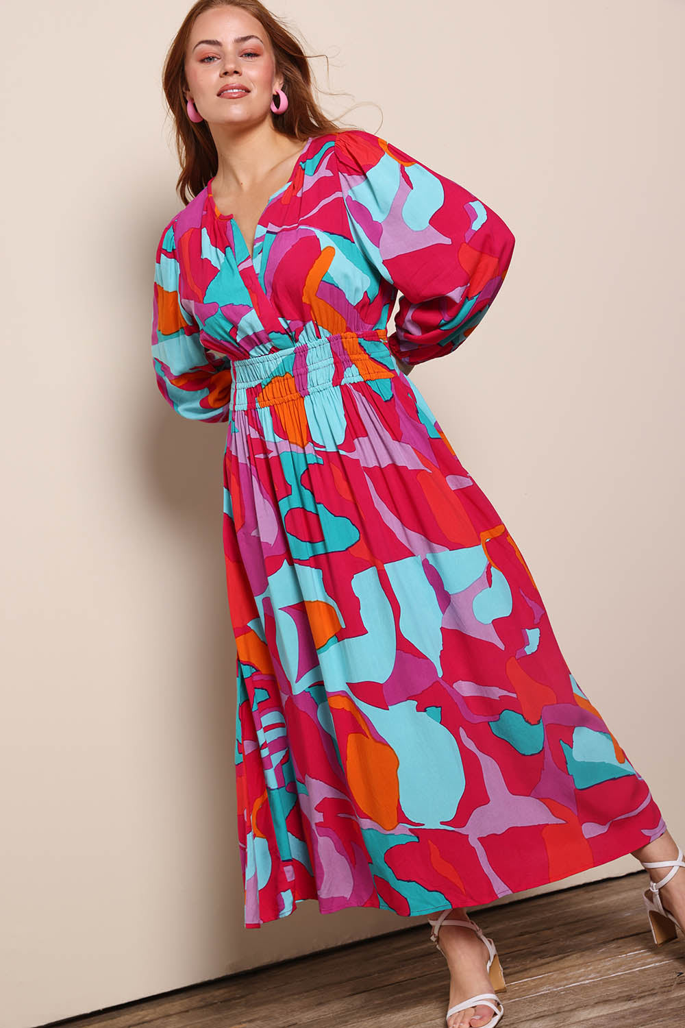 Model Georgiel wearing size 10 of the Gwyn Midi Dress – Marble in colour Marble, from the front